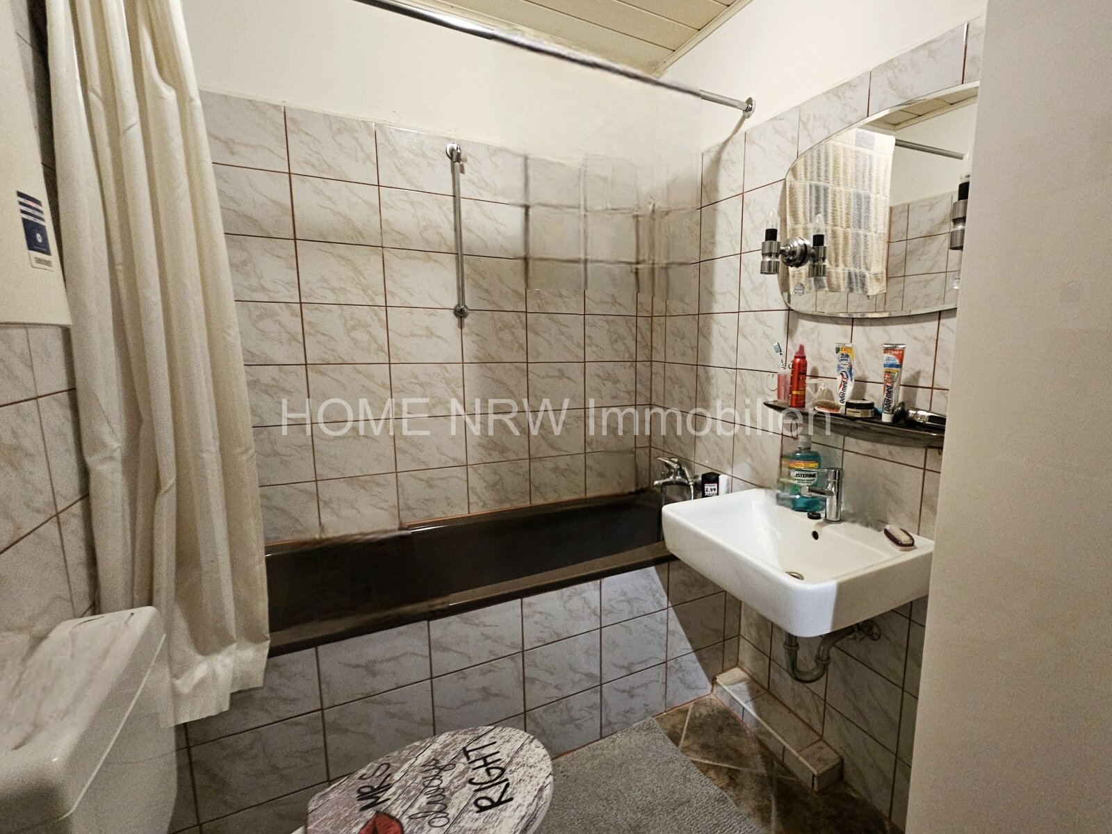 Moderne 2-Zimmer-Erdgeschosswohnung mit Süd-Balkon, Fußbodenheizung & optionaler Garage – ideal für Anleger und Eigennutzer