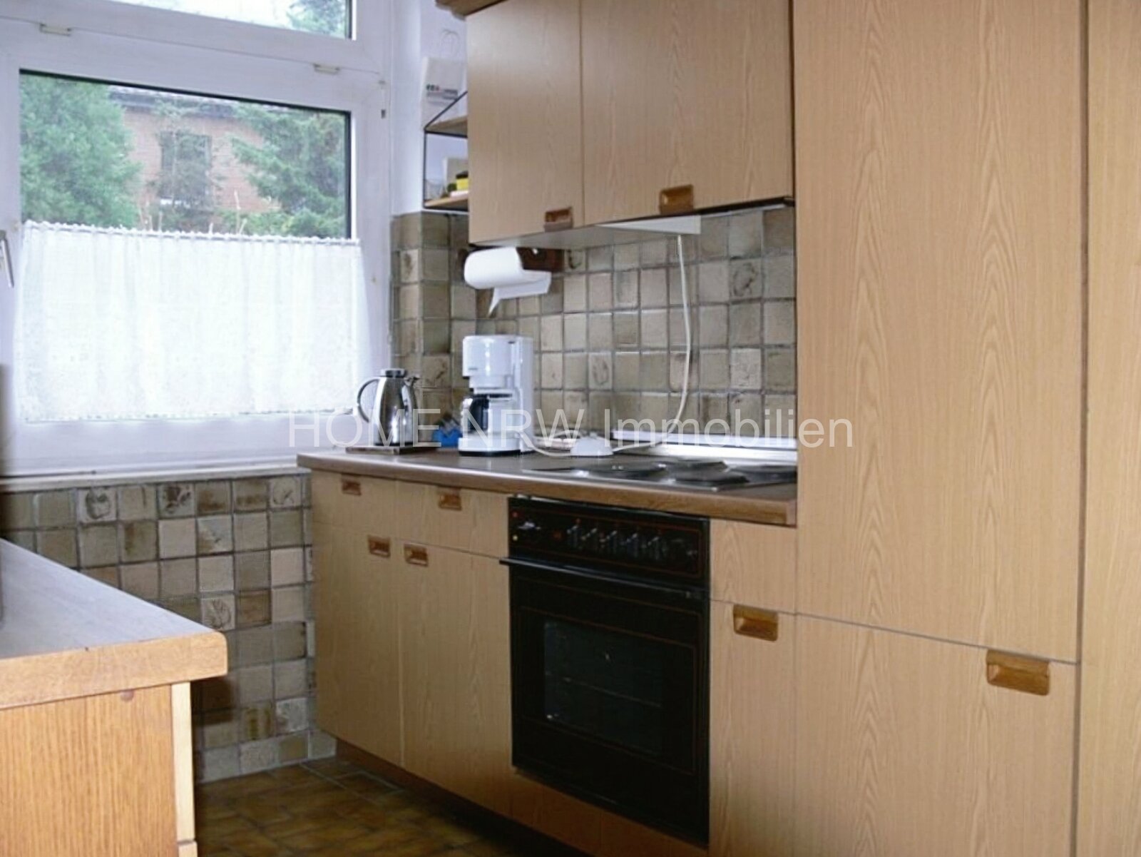 Moderne 2-Zimmer-Erdgeschosswohnung mit Süd-Balkon, Fußbodenheizung & optionaler Garage – ideal für Anleger und Eigennutzer