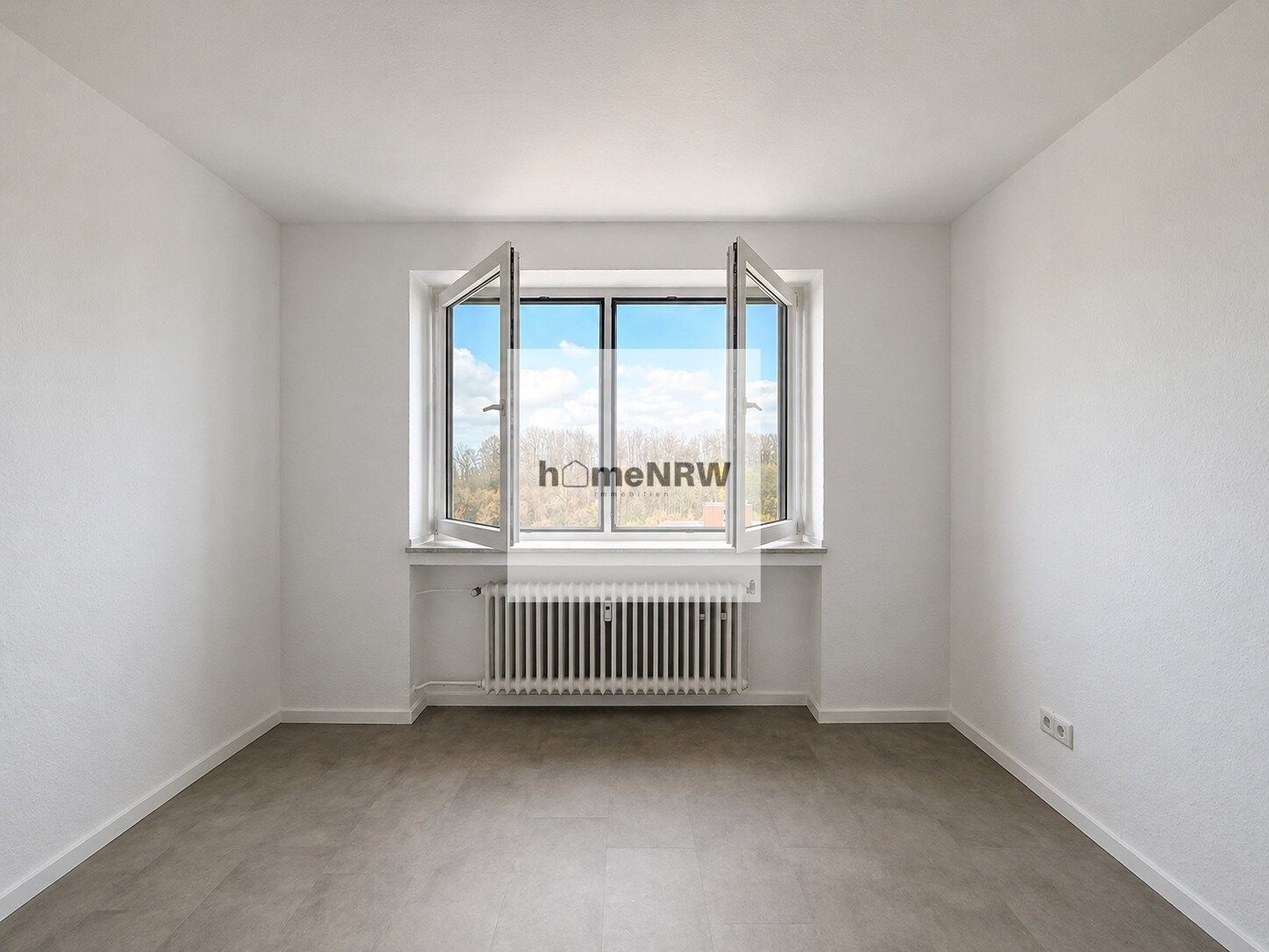 Modernisierte 3,5-Zimmer-Wohnung mit beeindruckendem Fernblick in zentraler Lage von Wülfrath